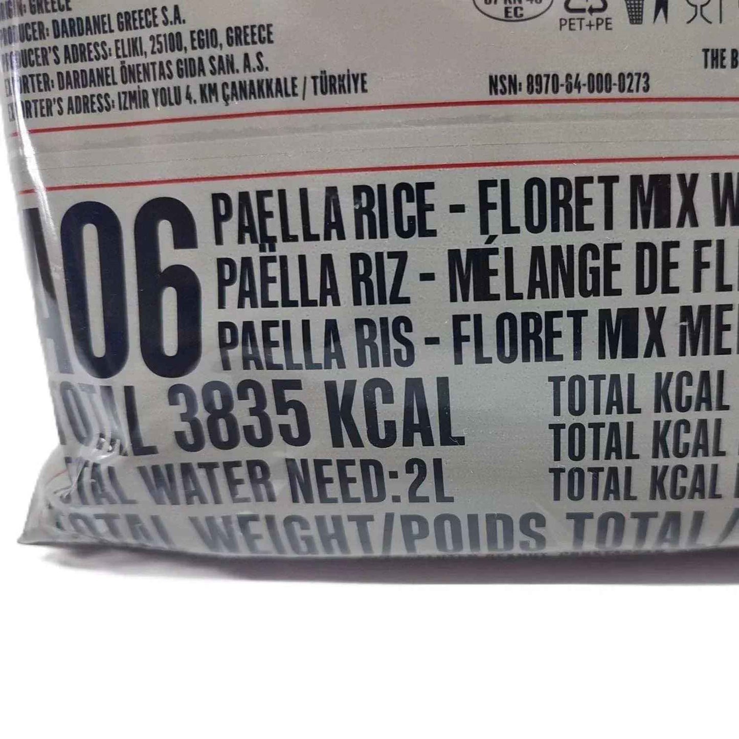 Bolsa de ración militar plateada con etiqueta 06 y calorías totales